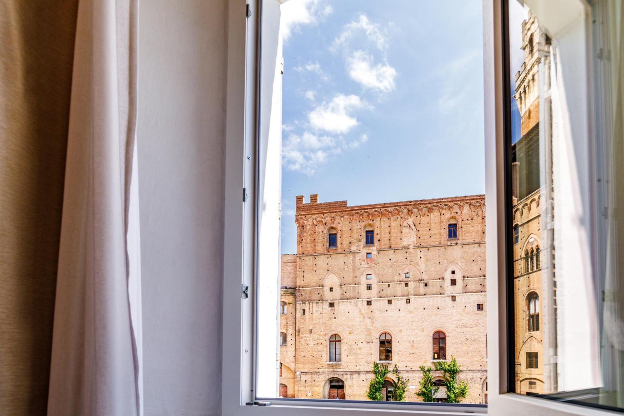Charme Centro Storico Apartment เซียนา ภายนอก รูปภาพ